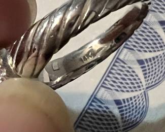 Here is the 14k stamp on the white gold peridot ring