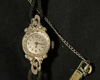 Women’s Bulova… Solid gold case with diamonds!!!