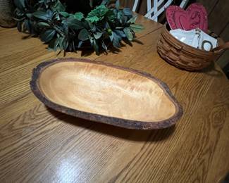 Custom carved wooden bowl from felled tree.