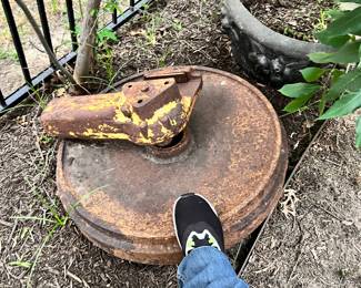 This might be part of a train-wreck…It is literally a train wheel!!! It’s in the backyard these are pretty valuable to collectors as they literally cost thousands to produce. Just by weight in high grade steel this is a small fortune… we’re pricing it well below market value and not helping move it. More pics of it at the end.