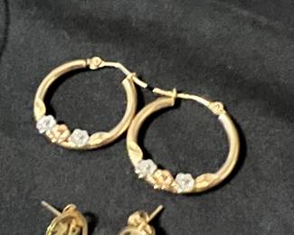 Another pair of gold earrings