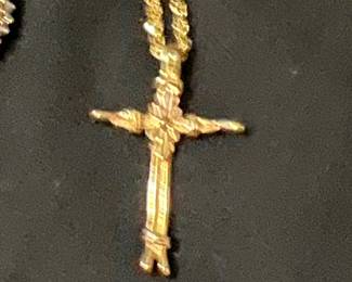 Gold cross pendant