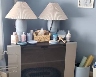 TV stand and bathroom accessories.
