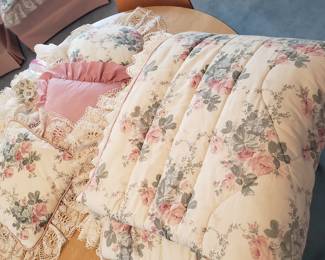 Bedding with matching shower curtain, curtains and throw pillows.