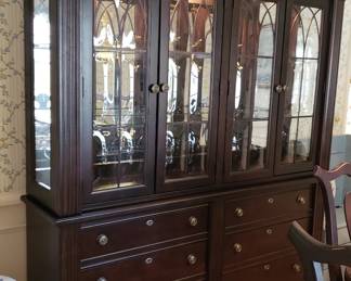 Fabulous lighted hutch with curved glass.  Like new.