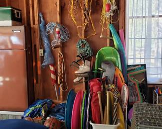 Fridge, water sport items.