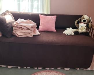 Jenny Lind daybed with trundle and (2) sets of covers.