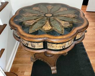 Round accent table. Has two drawers