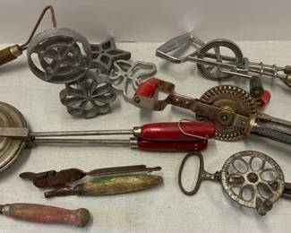 Vintage hand beaters, cookie cutter and can openers