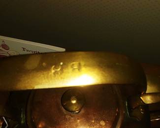 Stamped brass handle to kettle