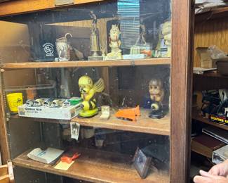Beautiful cabinet with Georgia Tech and other sports paraphernalia 