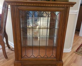 Pair of lighted curio cabinets