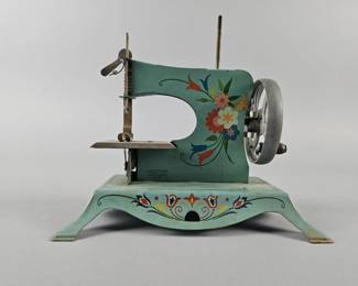 Lot 84 | Vintage Lindstrom "Little Miss" Toy Sewing Machine