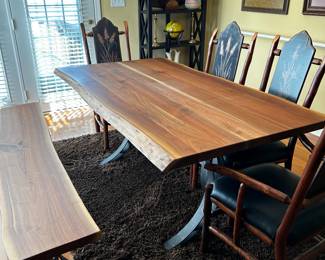 Table is by BARKMAN FURNITURE and chairs are BLACK FOREST HICKORY CHERRY. The client wants $3000.00 for the entire set. Please research these and you will see why this is a great deal!