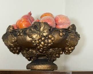 golden resin fruit bowl with pomegranates