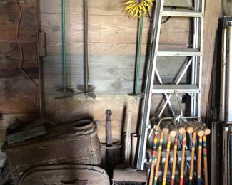 aluminum ladder, cast iron stove, croquet set