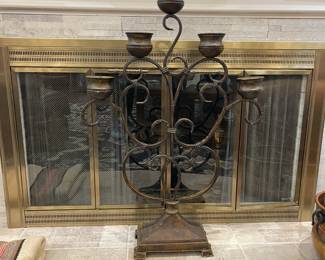 Heavy metal candle stand with scroll design