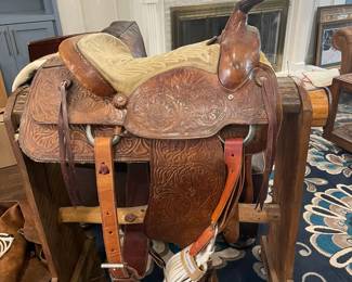 Bronco hand tooled saddle 16 inches