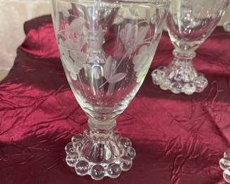Circa 1950's Berwick 'Boopie' glasses in three sizes with etched grapes and vines 