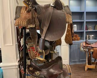 Western and English saddles, blankets and tack