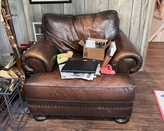 Extra deep leather armchair with hobnail accent and button feet. Excellent condition and incredibly comfortable!