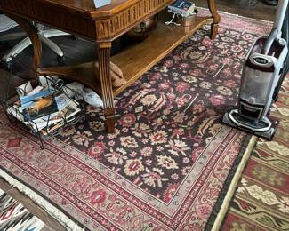 Numerous area rugs, including authentic Navajo rugs