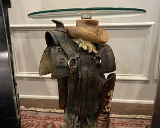 Western inspired side table with circular glass top