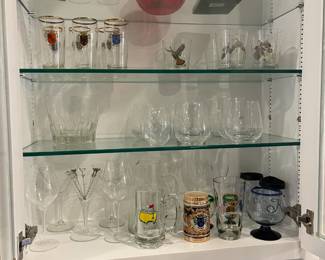 Beer glasses and vintage biscuit jar 