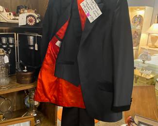 Autographed and Worn by RANDY TRAVIS; his  3-Piece Red-Lined Black Suit with Matching Shirt