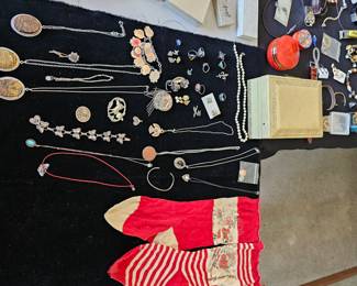 Sterling jewelry and antique Christmas stockings