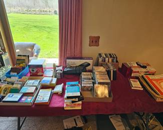 Cassettes,  DVDs, VHS,  and playing cards