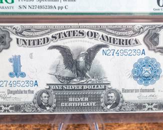 A 1899 $1 Silver Certificate "Black Eagle". Fr#236 Speelman | White. Graded by PMG a 66 EPQ Gem Uncirculated.