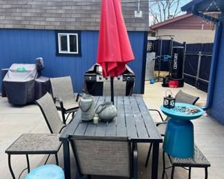 Table and chairsend tables, gas grill, garden decor