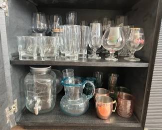 Glasses, wine glasses, copper mugs, pitchers, vases