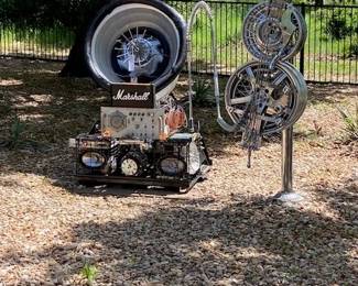 Artist Stan Combest created this using parts from  cars, plumbing supplies, BBQ grill, faucets, chicken feeder, and more.