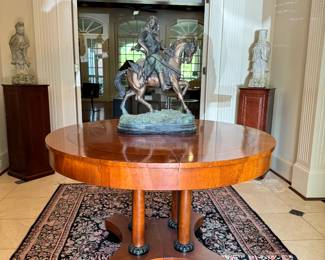 Baker Biedermeier style dining table with two leaves. 