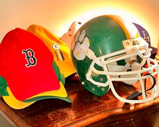Football helmet, baseball caps.