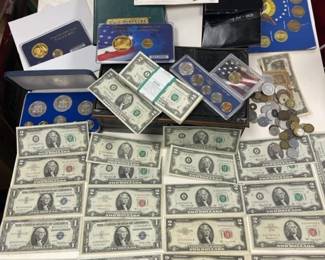 Strong box over $240 Face Value in  currency, Silver Certificates, Two Dollar Bill pack, collector us coin packs loose coins, foreign currency, coins and a foreign coin bracelet. . BOX NOT INCLUDED.