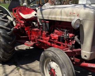 1954 Ford Tractor (runs like a singer sewing machine), Very well maintained, one owner, with one front blade, on has 2,300 hours, does not burn oil, has had many oil changes.