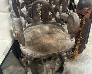Antique-Cameroon Throne for a KING-Bamileke chair. This is a heavy size throne; intricate carvings and the motifs are of the noble African Senfu tribe. Beautiful jungle lion's carvings!