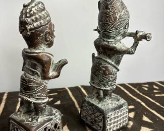 Benin bronze royal attendant figure w/side blown trumpet African tribal art.