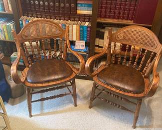 Pair of oak and leather chairs