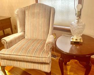Striped Wing Chair; Oval 1-Drawer Mahogany Side Table; Crystal Lamp