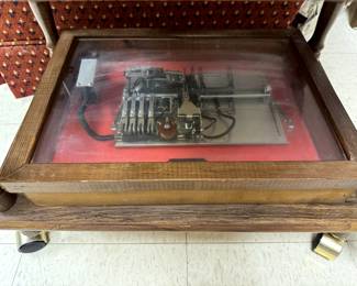 Inner Workings of Telephone Equipment in A Shadow Box