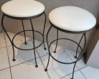 Pair of vintage  metal and white vinyl bar stools. $75 for both
Made by "Timmerman Manufacturing "