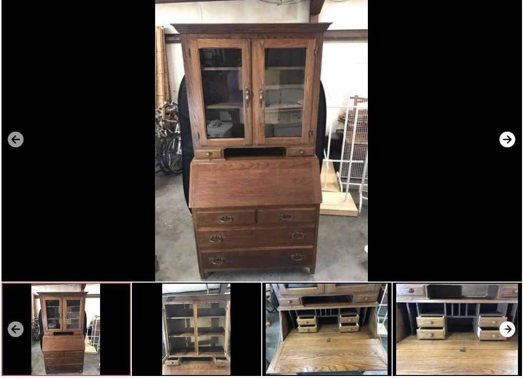 Lot # : 2 - Handmade Oak Drop Front Secretary
raised panel sides, solid Oak constructed, 4 drawers and 6 pencil drawers and 2 pieces for easy of hauling. Measures: 41" x 21" x 83" tall

