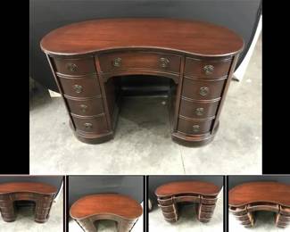 Lot # : 34 - Mahogany Kidney Shaped Desk
9 drawer, original hardware, dove tail constructed drawers. Measures: 46" x 19" x 30" tall.
