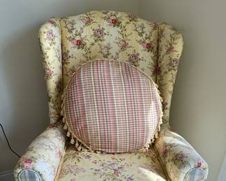 Pretty upholstered floral chair with ruffles