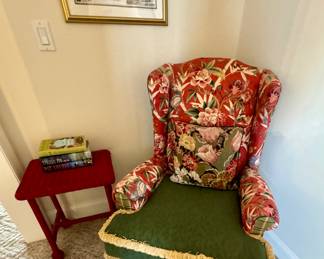 Upholstered chair and red wicker side chair