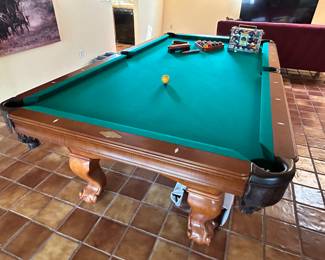 Beautiful  Imperial International billiards table with mother of pearl sights and hand carved legs. Must see !  Schedule your tuck and movers for the amazing find. 